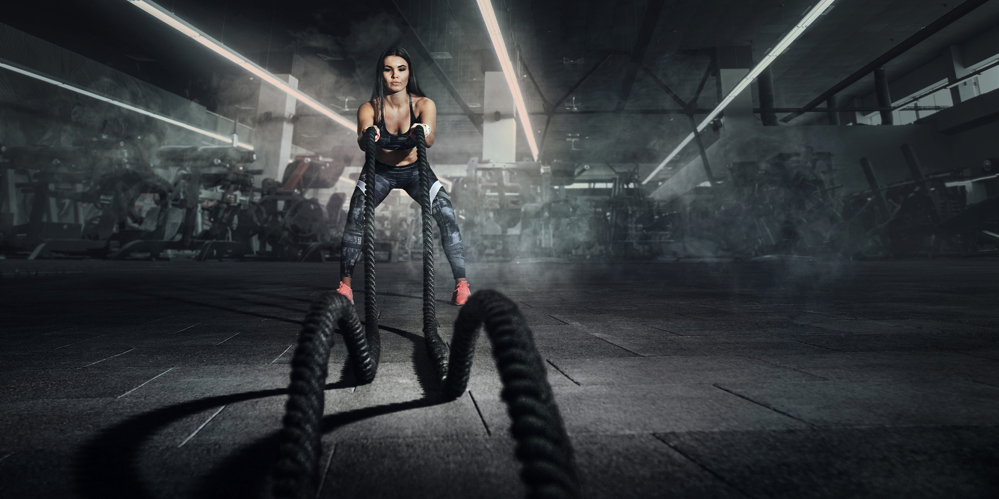 Atleta durante un allenamento con bilanciere al Planet Fitness Sassari